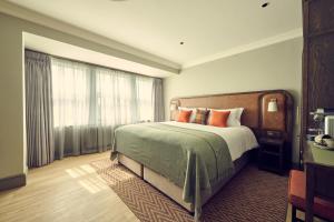 Voodi või voodid majutusasutuse The Leddie Hotel toas
