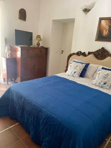 Letto o letti in una camera di Villa La Perla Capri