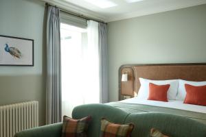 Voodi või voodid majutusasutuse The Leddie Hotel toas