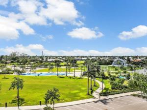 an image of a park with a green park at Elevated 886 Amazing Condo Park View in Marco Island