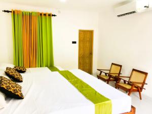 Postel nebo postele na pokoji v ubytování Banksia Villa