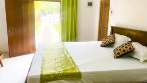 Postel nebo postele na pokoji v ubytování Banksia Villa
