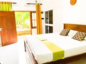 Postel nebo postele na pokoji v ubytování Banksia Villa
