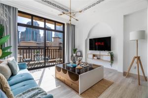 Et tv og/eller underholdning på GuestReady - Downtown lux near Burj Khalifa