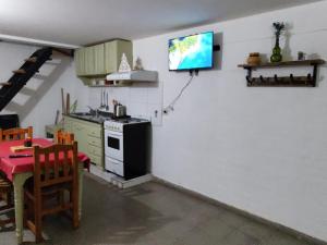 Kuchyň nebo kuchyňský kout v ubytování Departamento Stanza