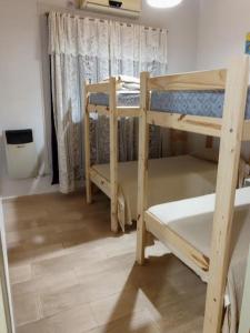 Postel nebo postele na pokoji v ubytování Departamento Stanza