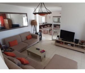 Μια τηλεόραση ή/και κέντρο ψυχαγωγίας στο Villa au bord de mer