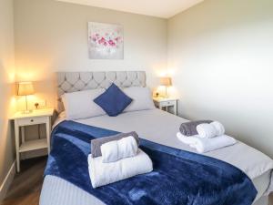 Postel nebo postele na pokoji v ubytování Orchard Lodge