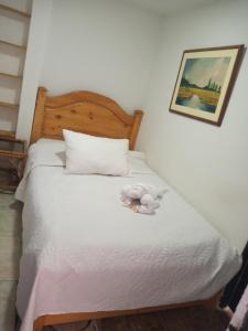 Feliz Amanecer客房内的一张或多张床位
