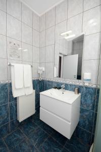 Koupelna v ubytování Hotel Andre´s