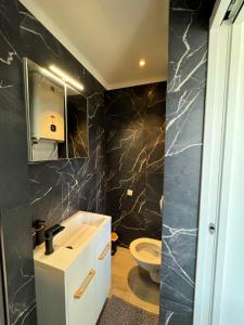 Ванная комната в L'IDEAL - Studio Hyper centre, Gare SNCF Nice Ville