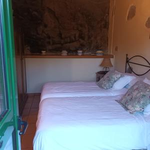 Postel nebo postele na pokoji v ubytování Finca El Lance Zumacal