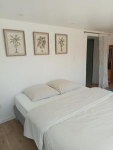 Postel nebo postele na pokoji v ubytování Grand studio tout équipé + 27 fotografií