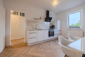 Køkken eller tekøkken på Hanse Villa - Apartment Bremen + 3 billeder