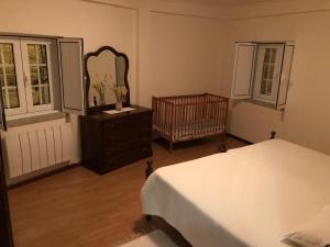 Ένα ή περισσότερα κρεβάτια σε δωμάτιο στο Casa Retiro de Xisto II
