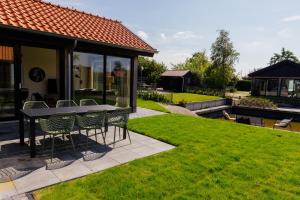 Ảnh trong thư viện ảnh của La Casita, Luxe Chalet Aan Het Water met Airco ở Anjum