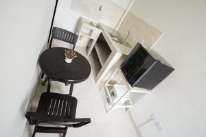 TV a/nebo společenská místnost v ubytování apartaestudios el portal del poblado