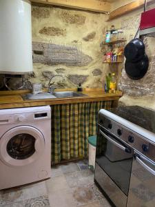 Η κουζίνα ή μικρή κουζίνα στο A Calma