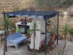 Patio nebo venkovní prostory v ubytování Gozo Holiday Home -Tranquil and Serene