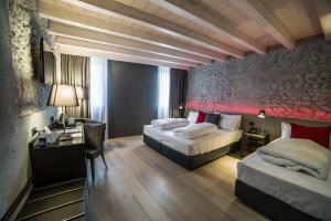 Posteľ alebo postele v izbe v ubytovaní Locanda al Vescovo & SPA