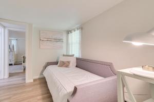 a living room with a couch and a table at Gaylord Family Home Walk to Shops and Restaurants! in Gaylord