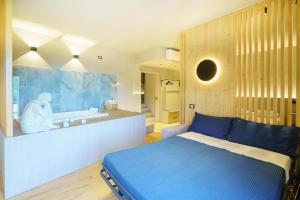 Postel nebo postele na pokoji v ubytování Atarassia suite luxury