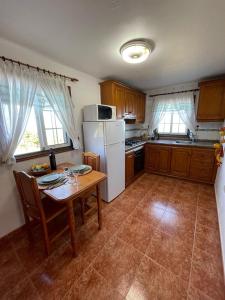 Kuchyň nebo kuchyňský kout v ubytování Casa Demetria