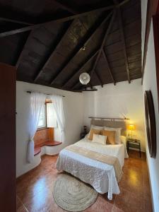 Postel nebo postele na pokoji v ubytování Casa Demetria