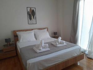 Postel nebo postele na pokoji v ubytování Irene Luxe Loft