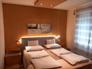 Postel nebo postele na pokoji v ubytování Residence Wiesenheim + 37 fotografií