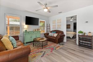 a living room with a couch and a table at Piece of Heaven in New Braunfels