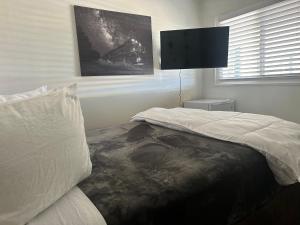 Postel nebo postele na pokoji v ubytování Grand Central Motel