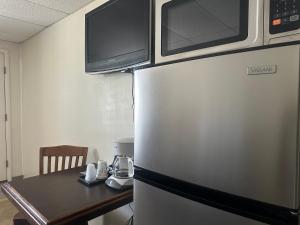 Kuchyň nebo kuchyňský kout v ubytování Grand Central Motel