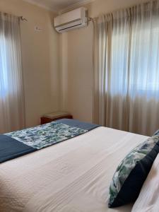 Postel nebo postele na pokoji v ubytování Pichoses Suites - Gerês + 11 fotografií