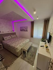 Postel nebo postele na pokoji v ubytování GOLD APARTMANI
