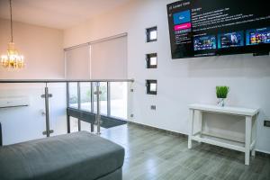 TV a/nebo společenská místnost v ubytování Estudio 1850