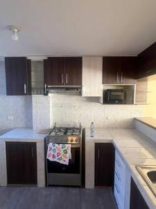 Dapur atau dapur kecil di Apartment very close to the main square