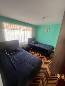 Katil atau katil-katil dalam bilik di Apartment very close to the main square +1 gambar