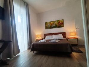 Ένα ή περισσότερα κρεβάτια σε δωμάτιο στο Rome Apartment D'Amata