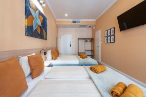 Posteľ alebo postele v izbe v ubytovaní Budapest Holidays Downtown