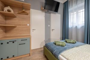 Posteľ alebo postele v izbe v ubytovaní Budapest Holidays Downtown