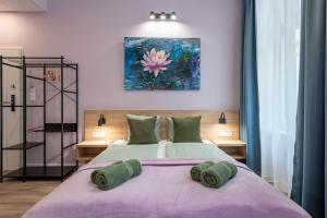 Posteľ alebo postele v izbe v ubytovaní Budapest Holidays Downtown + 37 fotografií