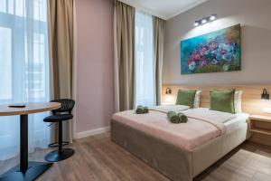 Posteľ alebo postele v izbe v ubytovaní Budapest Holidays Downtown