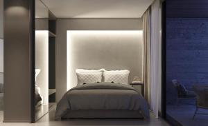 Postel nebo postele na pokoji v ubytování PortoAltomeuresort