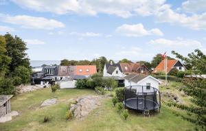 an aerial view of a house with a gazebo at Beautiful Home In Allinge With Kitchen in Allinge +20 photos