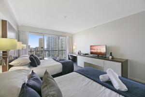 Katil atau katil-katil dalam bilik di Ocean View 2-Bed Studio In the Heart of Surfers +6 gambar