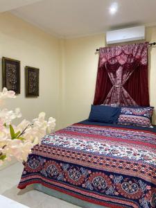 Katil atau katil-katil dalam bilik di Rivière Chateau 2- Gros Islet 10 mins to Beach, Rodney Bay and Stadium