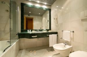 Koupelna v ubytování Grand Hotel Barone Di Sassj