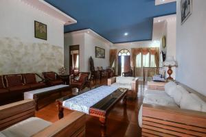 Χώρος καθιστικού στο Aldeoz Villa Pagar Alam