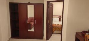Postel nebo postele na pokoji v ubytování Hotel Geetha International